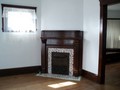 Oak and tile fireplaces in each unit